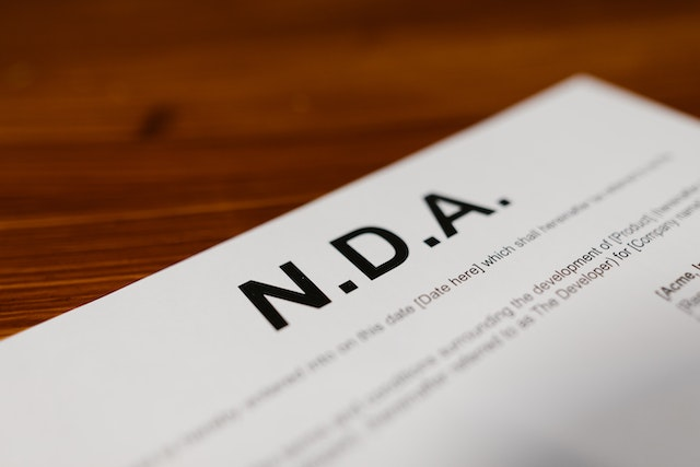 Close-up of a Non-Disclosure Agreement (NDA) document, highlighting the importance of legal documents like proforma invoices in securing business transactions.